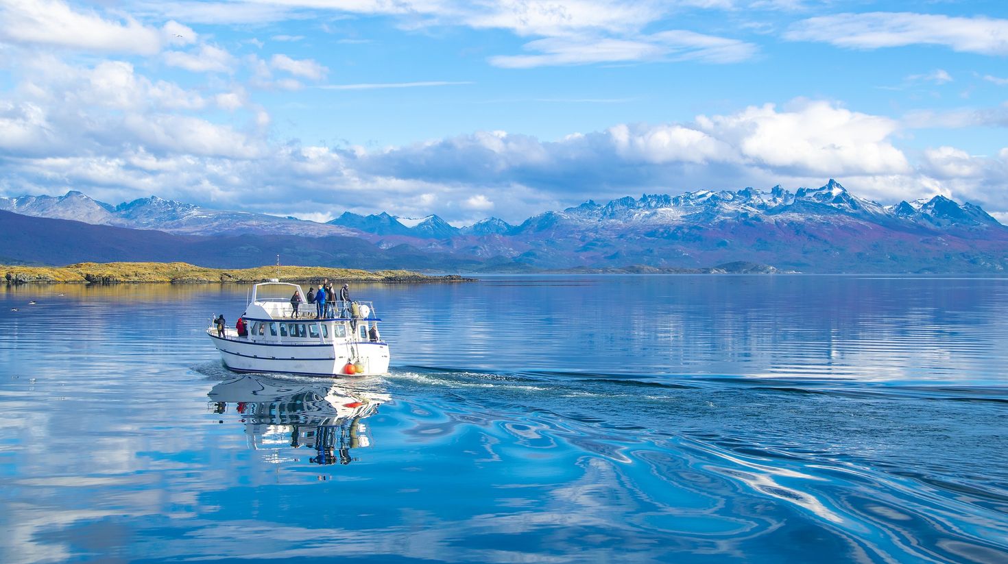 A boat with tourists in Beagle Channel, Ushuaia.