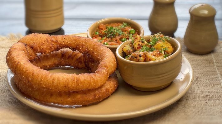 Sel roti is offered in a Nepalese restaurant