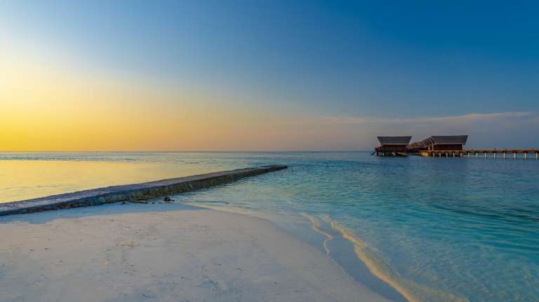 A secluded beach at a holiday resort, one of the top 10 things to do in Maldives.