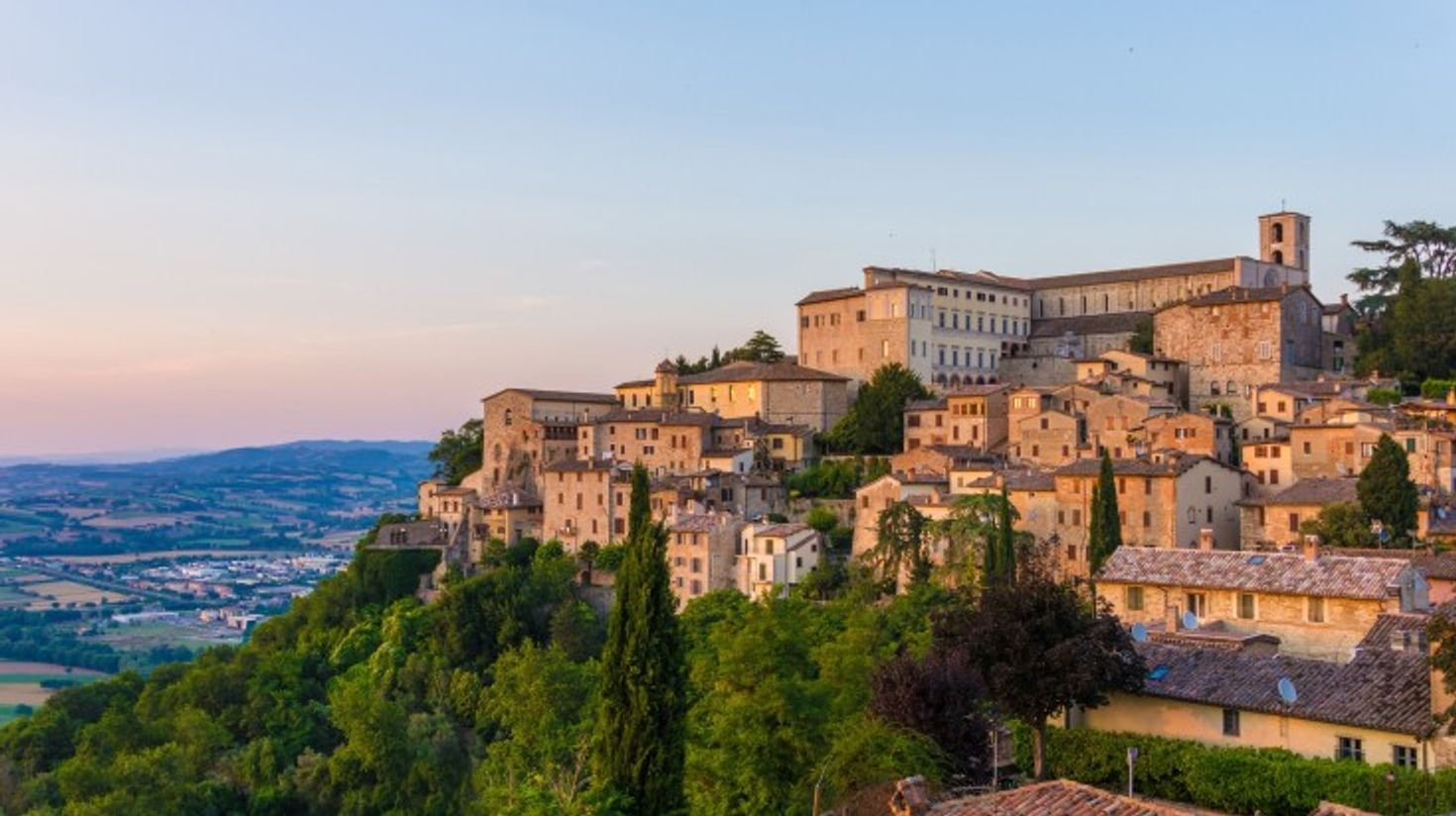 The medieval town of Umbria explored when traveling from Venice to Naples.