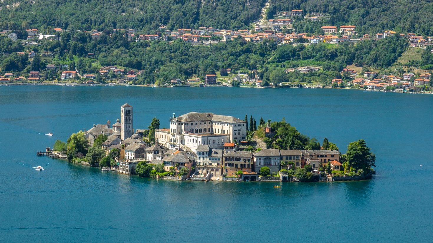 Small charming island on Lake Orta in Italy on a clear day.