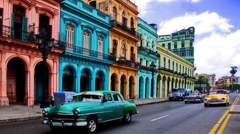 Driving vintage cars in Old Havana—one of the best things to do in Cuba.