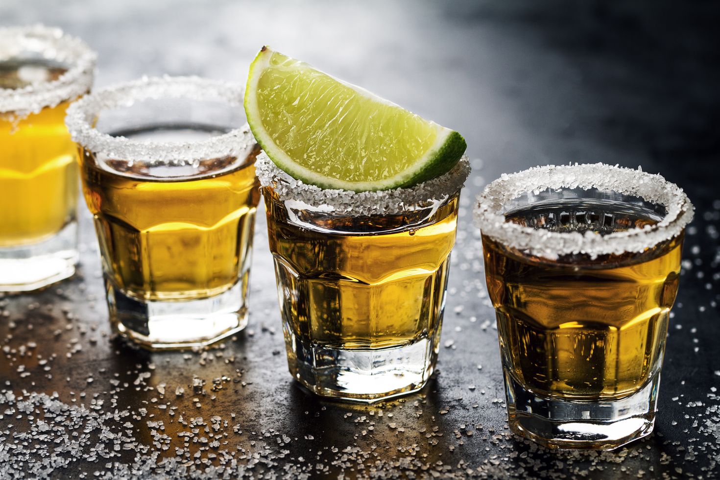 Three tequila glasses displayed on the table.