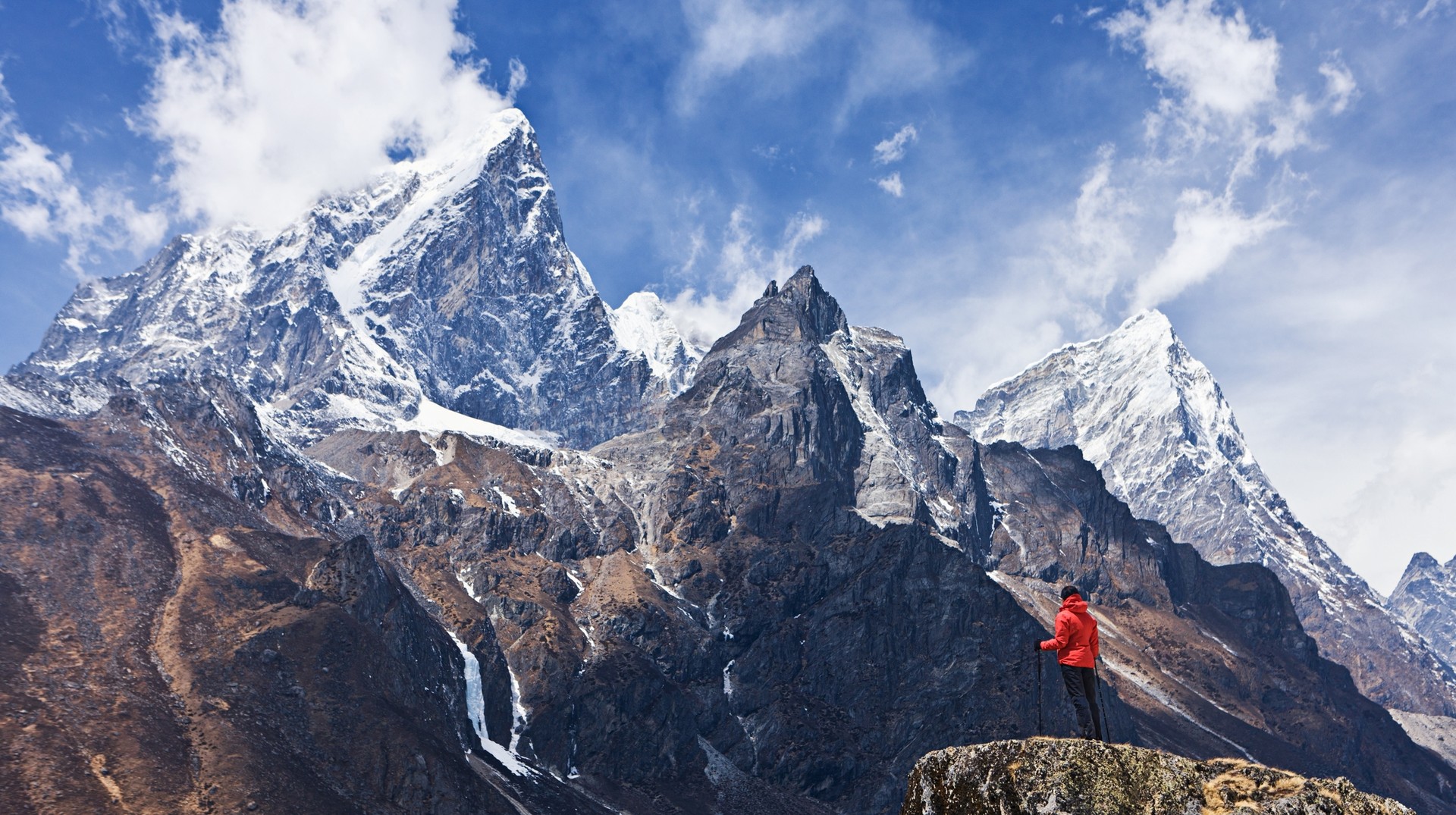 Woman looking at the mountains in the Everest region Amazing view of Everest National Park