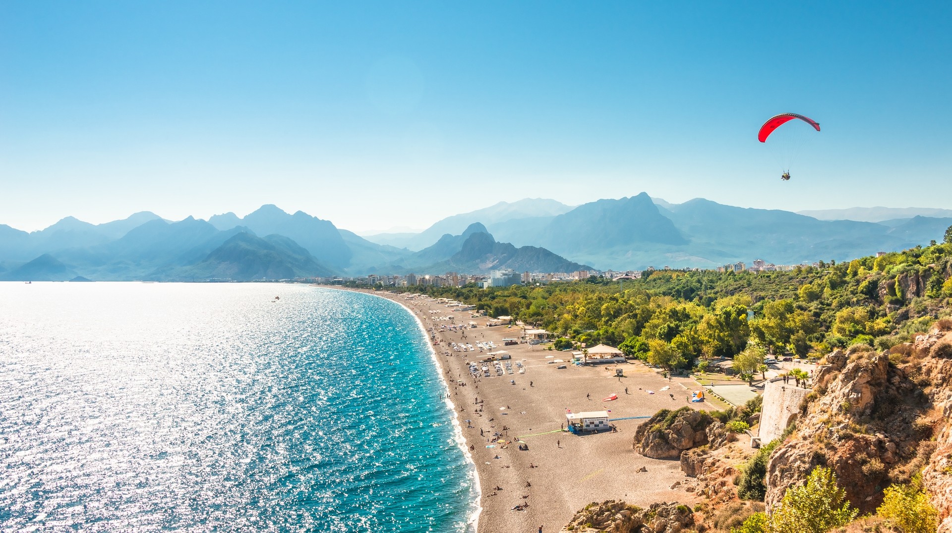 As Autumn begins in Turkey in September, the weather becomes pleasant for a beach getaway. Panoramic view of the Antalya and Mediterranean seacoast in Turkey in September.