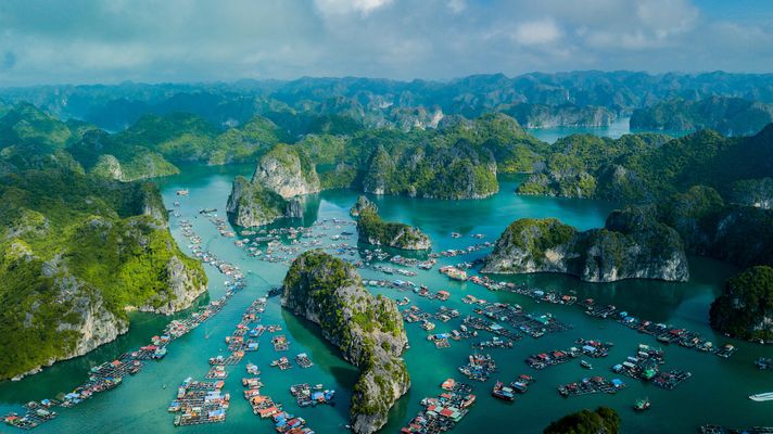 Visit  Halong Bay in Vietnam.