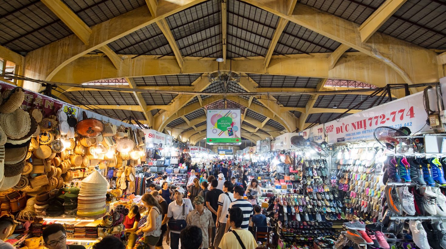 Laneway within Ben Thanh Market where you can shop while touring Vietnam.