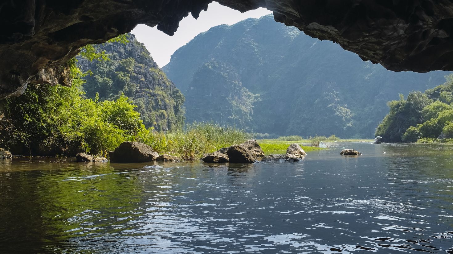 View of the nature from inside a cave in Ninh Binh in Vietnam