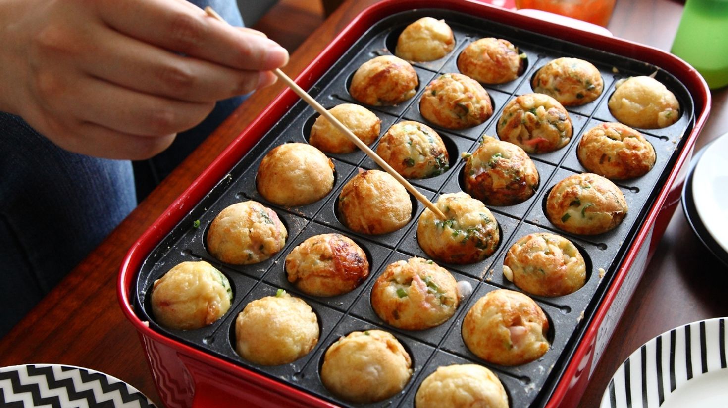 Takoyaki is a round shaped snack in Japan and consists of minced octopus.