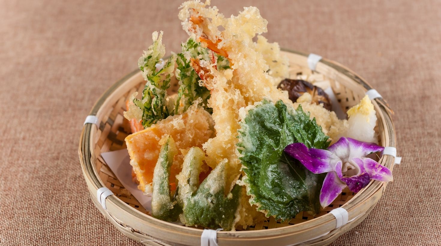 If you're thinking of what to eat in Japan try Tempura, a battered and deep-fried version of vegetables and seafood.