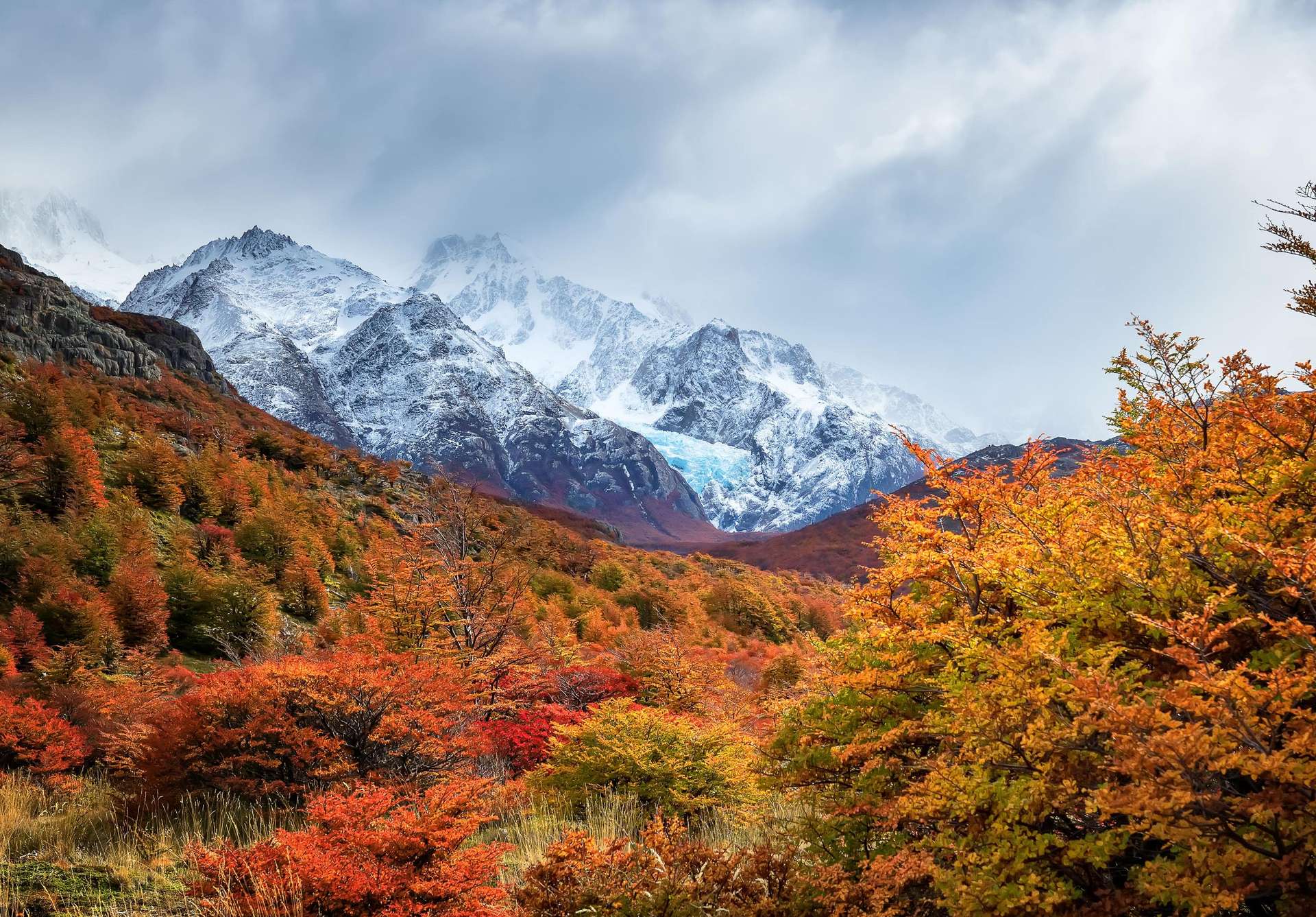 White Stones Glacier in autumn red colored forest.